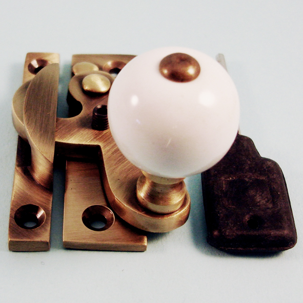 THD108L/AB • Non-Locking • Antique Brass • Locking Clo Ceramic Knob Sash Fastener